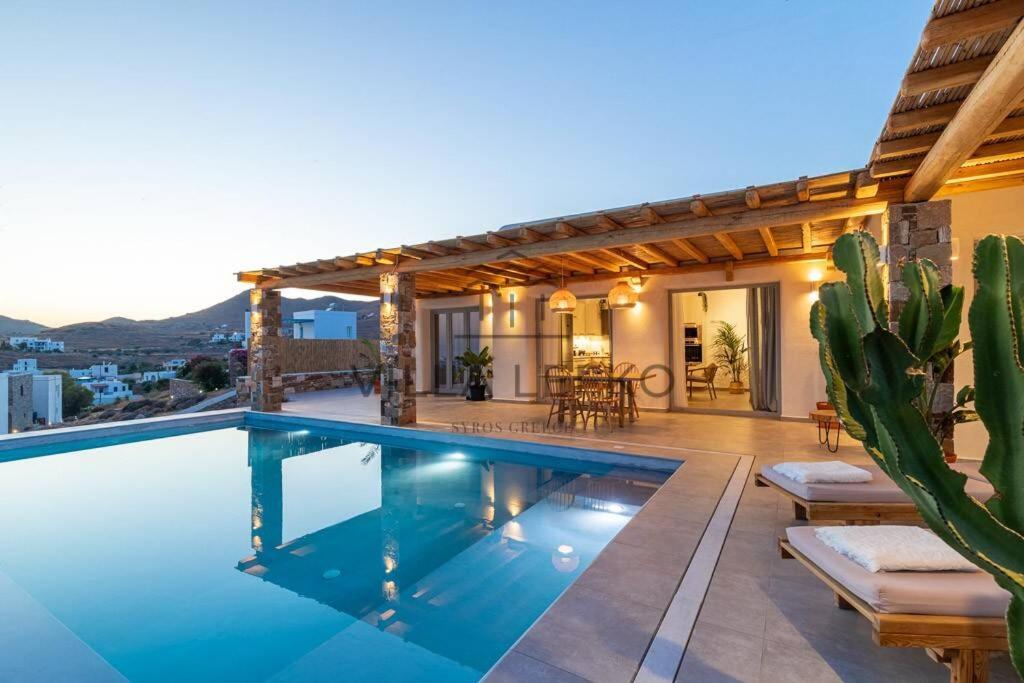 overflow swimming pool with Astral lights and pump